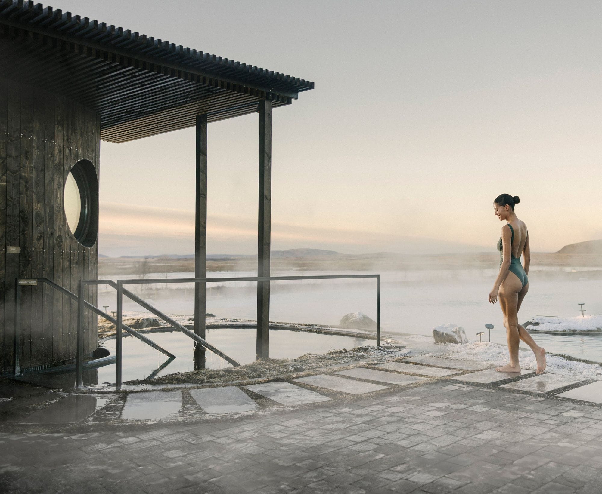 Guest walking to the cold pool in winter mist