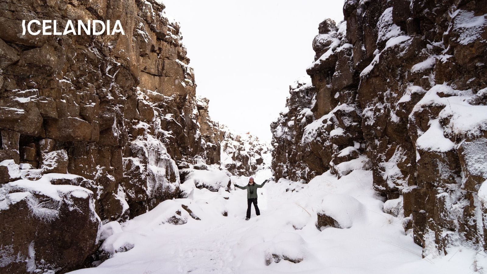 person in thingvellir during winter